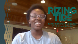Faith Blanchard-Ludanga, smiling while on a virtual phone call. Next to her, green text reads "Rizing Tide, Faith Blanchard-Ludanga, 2023 Crest Scholar."