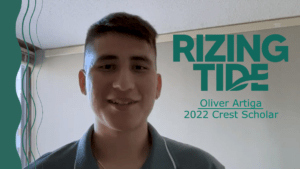 Oliver Artiga smiling while on a virtual phone call. Next to him, green text reads "Rizing Tide, Oliver Artiga, 2022 Crest Scholar"
